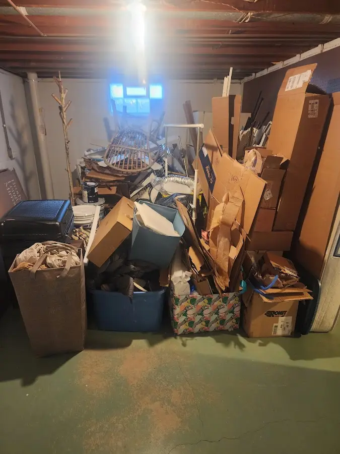 Roll-off dumpster container at job site for Yard Waste Dumpster Rental in McDonald